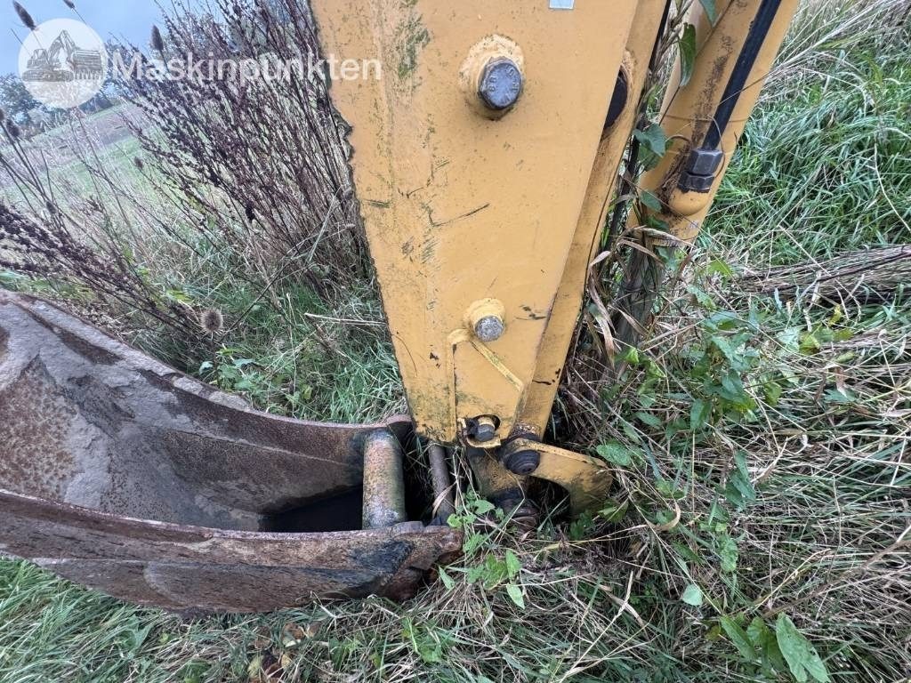 Tractopelle New Holland LB 115: photos 22 Tractopelle New Holland LB 115: photos 22