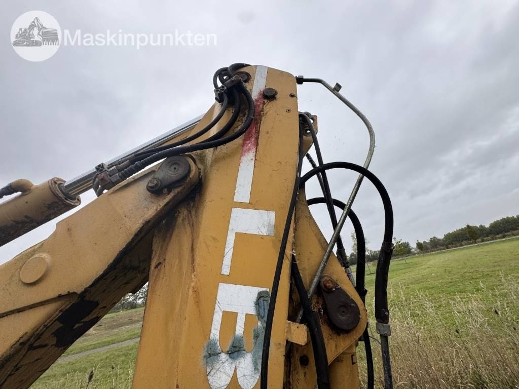 Tractopelle New Holland LB 115: photos 25 Tractopelle New Holland LB 115: photos 25