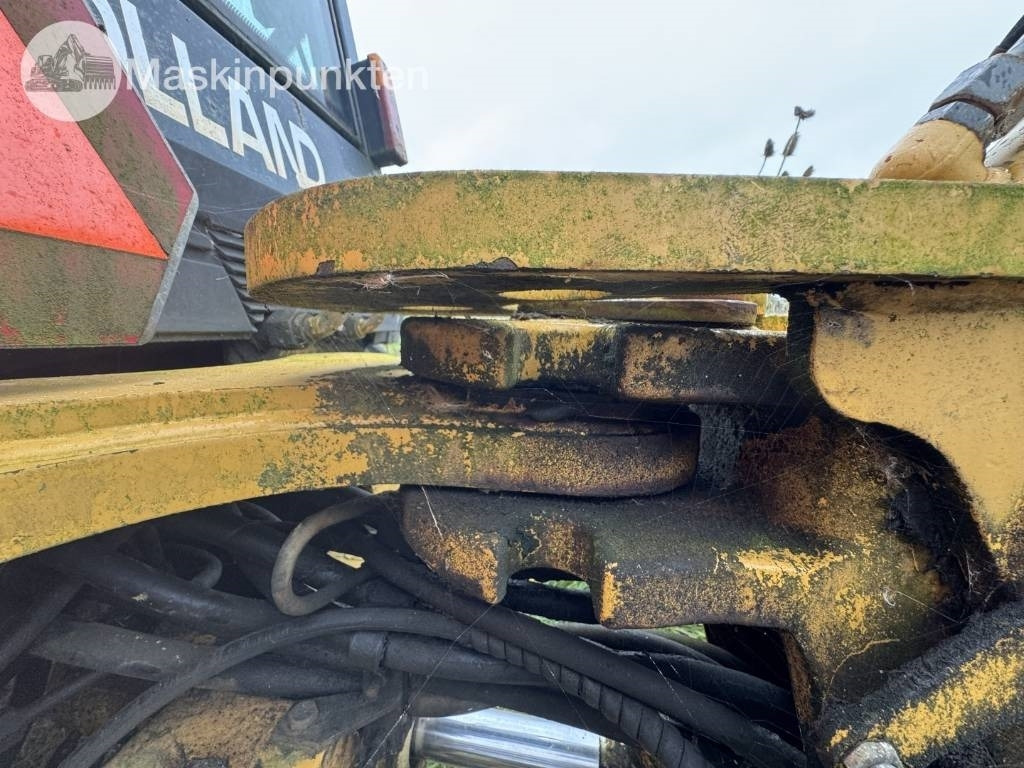 Tractopelle New Holland LB 115: photos 17 Tractopelle New Holland LB 115: photos 17