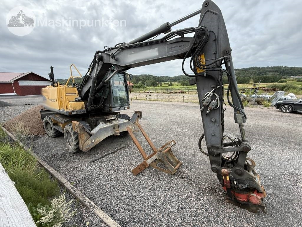 Volvo EW 140 C - Pelle sur pneus: photos 3 Volvo EW 140 C - Pelle sur pneus: photos 3