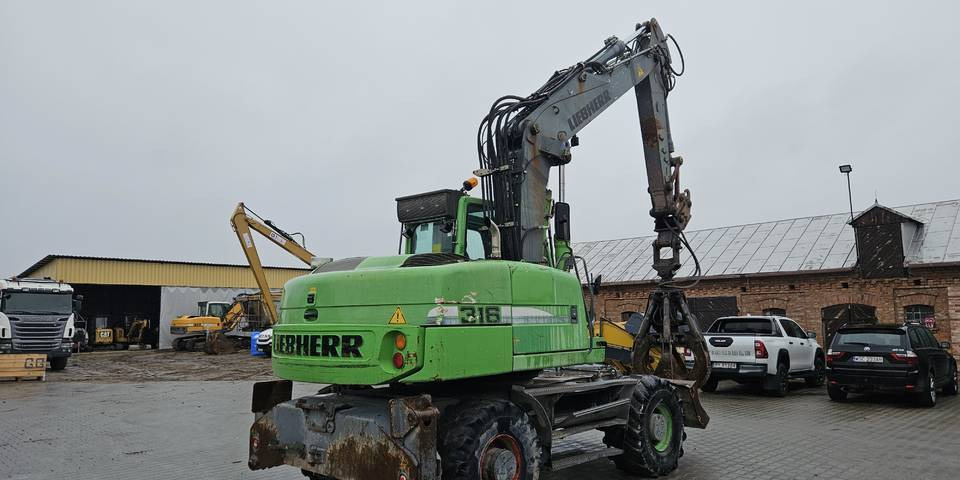 Koparka kołowa Liebherr A 316 Litronic chwytak podpory pług - Pelle sur pneus: photos 5 Koparka kołowa Liebherr A 316 Litronic chwytak podpory pług - Pelle sur pneus: photos 5