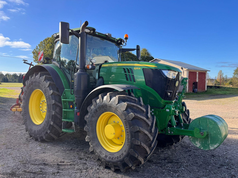 John Deere 6215R Autopowr - Tracteur agricole: photos 1 John Deere 6215R Autopowr - Tracteur agricole: photos 1