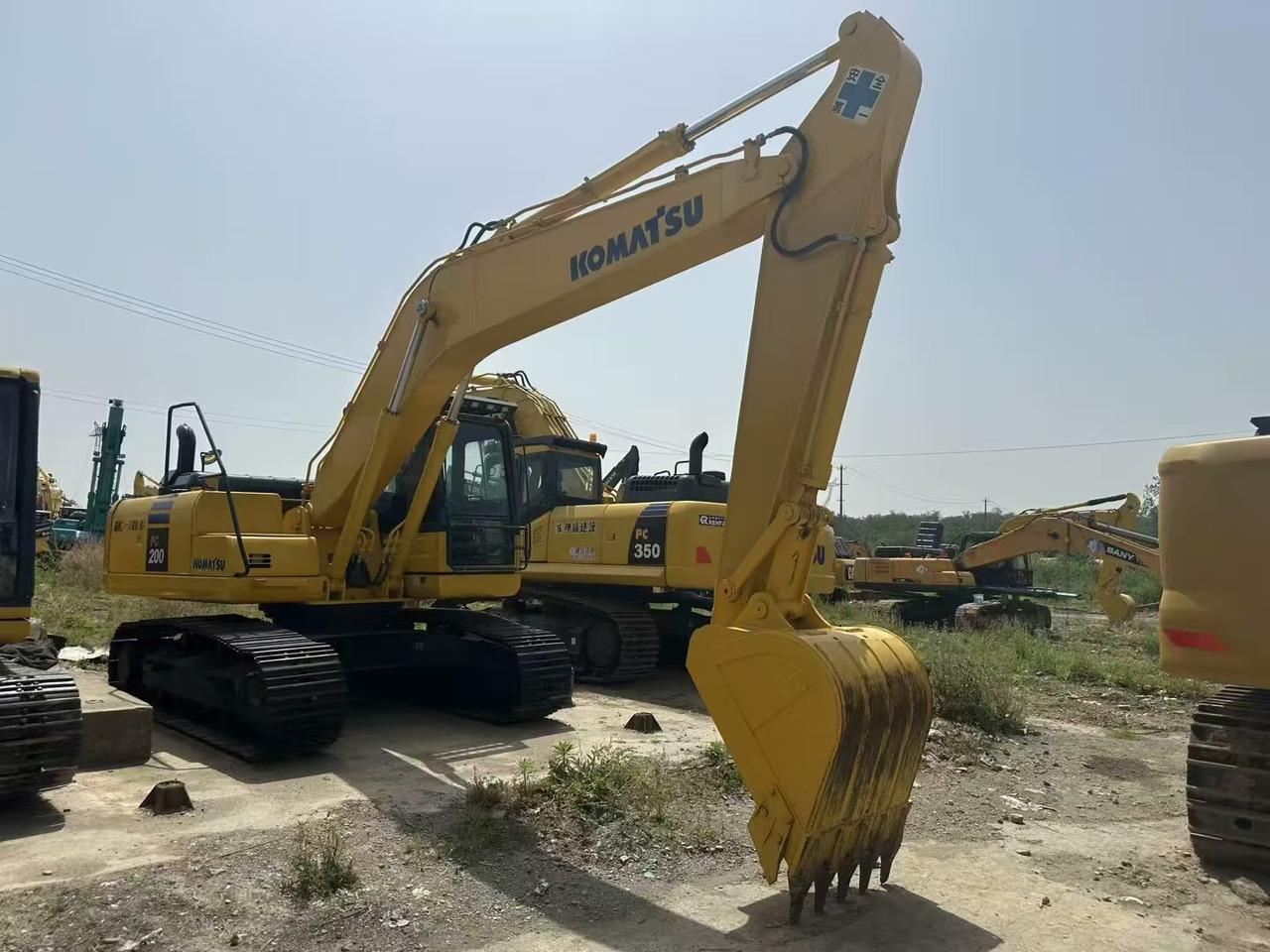 Pelle sur pneus KOMATSU 200-8: photos 8