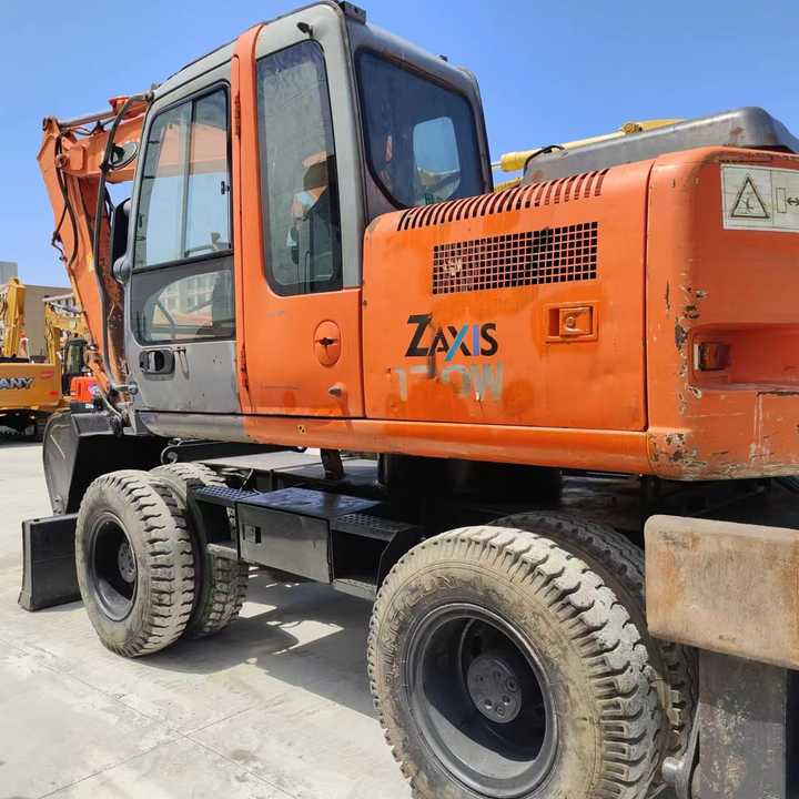 Used Japan Original Brand Hitachi Zx 130w Wheel Excavator Hitachi Zx120 130 200 Excavator for Sale - Pelle sur pneus: photos 5 Used Japan Original Brand Hitachi Zx 130w Wheel Excavator Hitachi Zx120 130 200 Excavator for Sale - Pelle sur pneus: photos 5