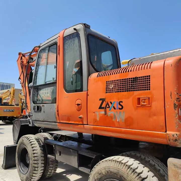 Used Japan Original Brand Hitachi Zx 130w Wheel Excavator Hitachi Zx120 130 200 Excavator for Sale - Pelle sur pneus: photos 3 Used Japan Original Brand Hitachi Zx 130w Wheel Excavator Hitachi Zx120 130 200 Excavator for Sale - Pelle sur pneus: photos 3
