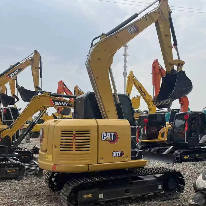 Cat Machine Used Mini Excavator CAT307 Cat Used Excavator - Pelle sur chenille: photos 1 Cat Machine Used Mini Excavator CAT307 Cat Used Excavator - Pelle sur chenille: photos 1