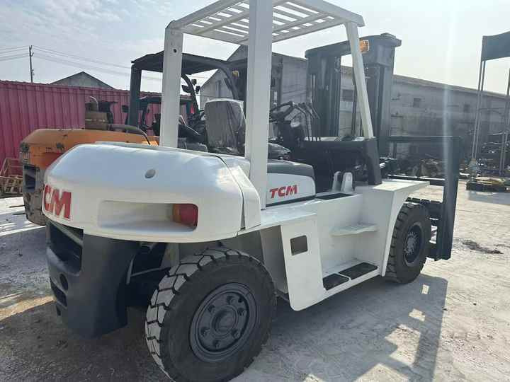 High Quality TCM 7 Ton with Hydraulic Distance Adjustment Used Forklift in Stock Used tcm Forklift 7 Ton Used tcm Fd70 Forklift - Chariot élévateur: photos 2 High Quality TCM 7 Ton with Hydraulic Distance Adjustment Used Forklift in Stock Used tcm Forklift 7 Ton Used tcm Fd70 Forklift - Chariot élévateur: photos 2