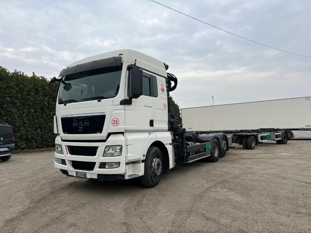 MAN TGX 26.480 SCARRABILE CON GRU - Camion ampliroll: photos 1 MAN TGX 26.480 SCARRABILE CON GRU - Camion ampliroll: photos 1
