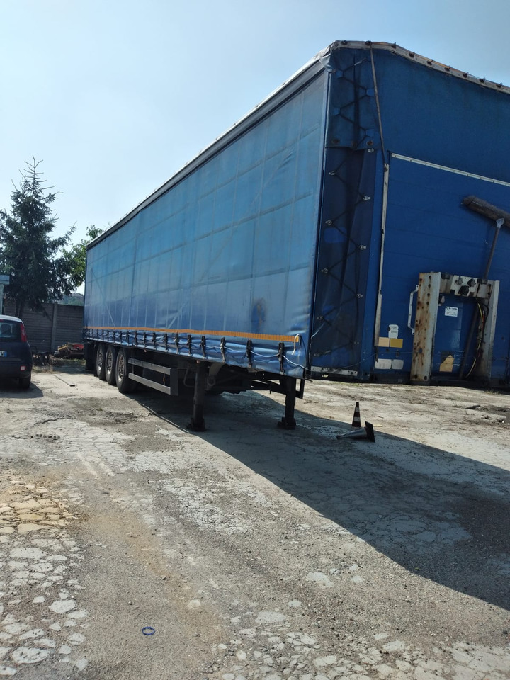 Semirimorchio centinato - Semi-remorque rideaux coulissants: photos 1 Semirimorchio centinato - Semi-remorque rideaux coulissants: photos 1