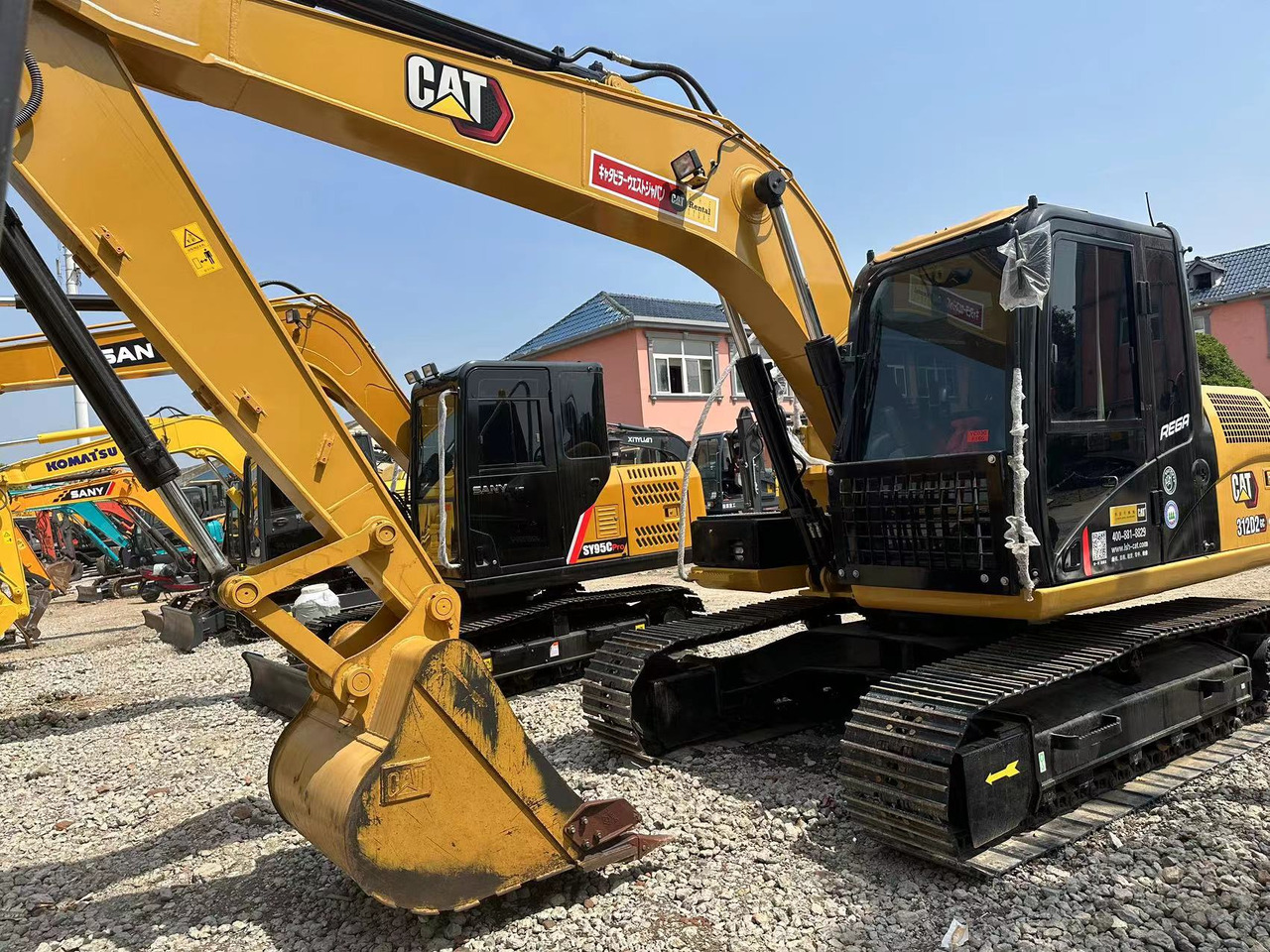 CATERPILLAR 312D Wheel Excavator Click for Discount - Pelle sur pneus: photos 1 CATERPILLAR 312D Wheel Excavator Click for Discount - Pelle sur pneus: photos 1