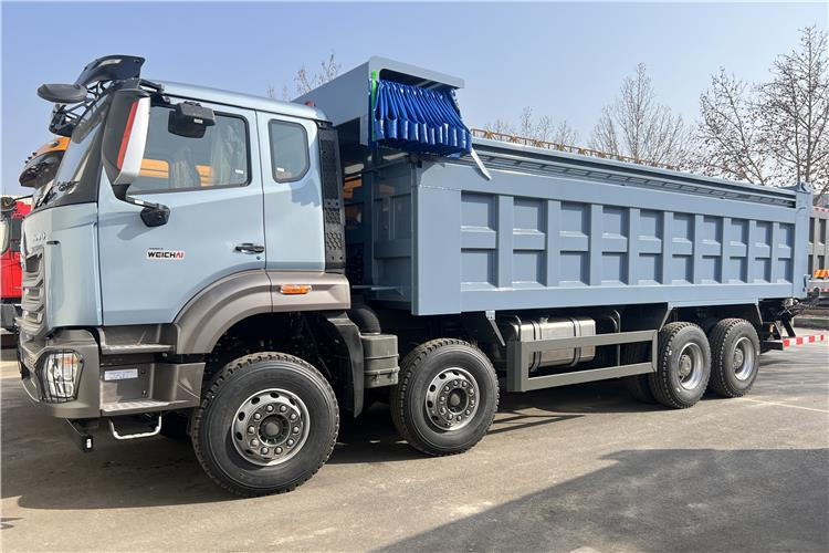 SINOTRUK Used Howo NX 380 Dump Truck with Weichai Engine In Angola - Camion benne: photos 1 SINOTRUK Used Howo NX 380 Dump Truck with Weichai Engine In Angola - Camion benne: photos 1