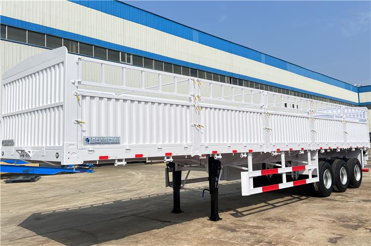 TITAN Tri Axle 60 Ton Fence Cargo Semi Trailer for Sale In Guinea - Semi-remorque bétaillère: photos 1 TITAN Tri Axle 60 Ton Fence Cargo Semi Trailer for Sale In Guinea - Semi-remorque bétaillère: photos 1