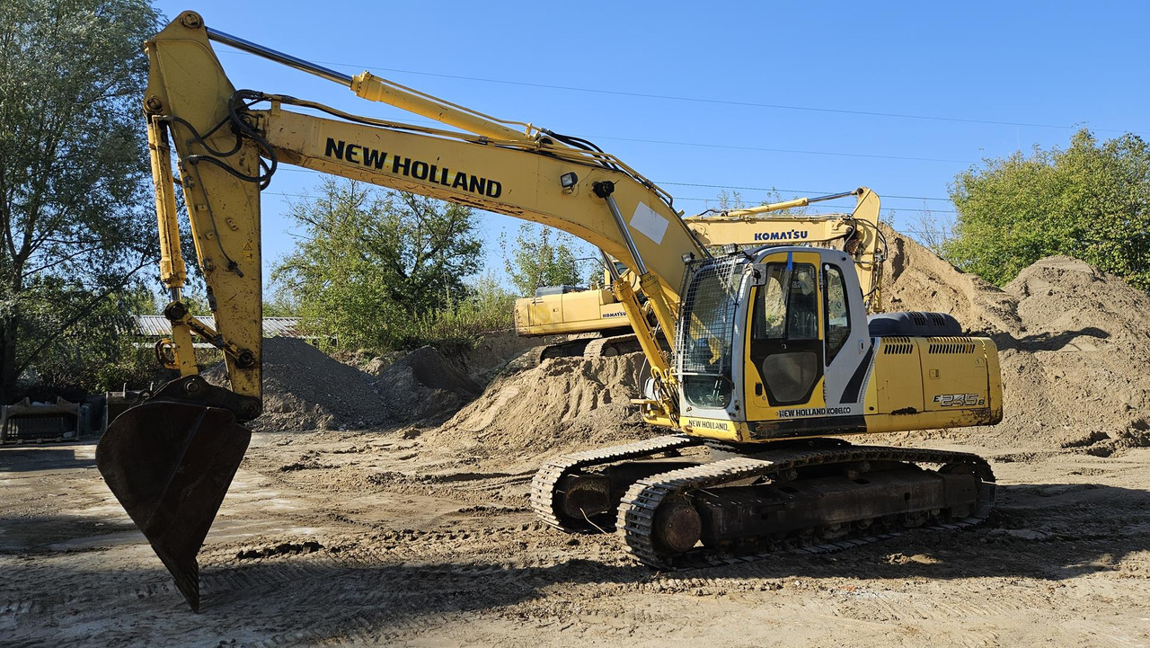 NEW HOLLAND E 245 B - Pelle sur chenille: photos 2 NEW HOLLAND E 245 B - Pelle sur chenille: photos 2