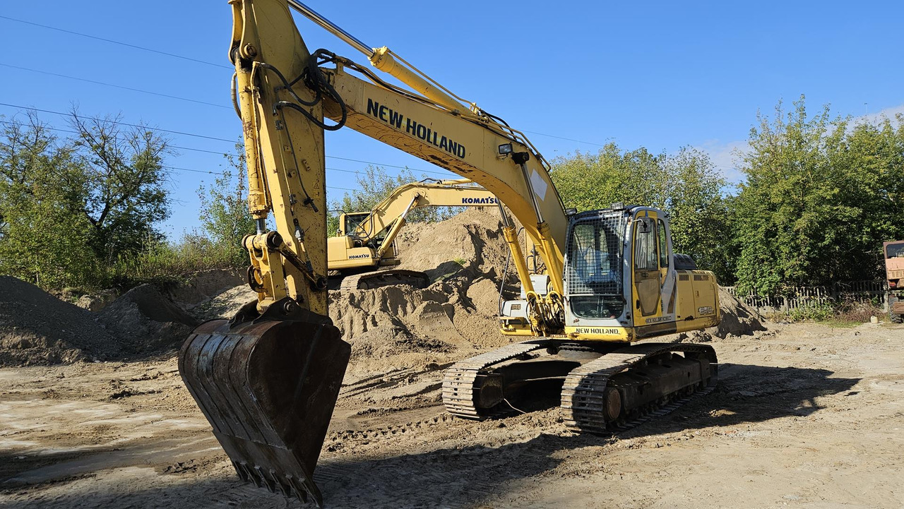 NEW HOLLAND E 245 B - Pelle sur chenille: photos 1 NEW HOLLAND E 245 B - Pelle sur chenille: photos 1