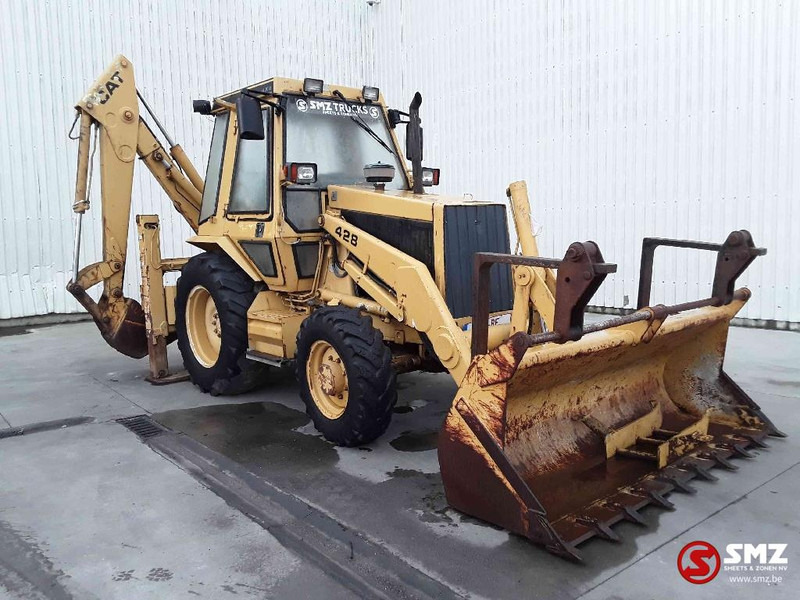 Caterpillar 428 - Tractopelle: photos 1 Caterpillar 428 - Tractopelle: photos 1