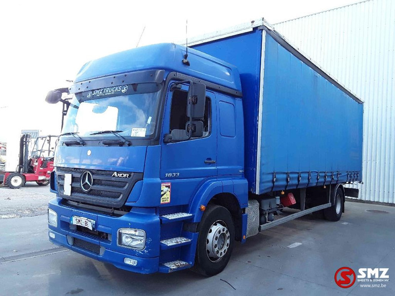 Mercedes-Benz Axor 1833 - Camion à rideaux coulissants: photos 3 Mercedes-Benz Axor 1833 - Camion à rideaux coulissants: photos 3