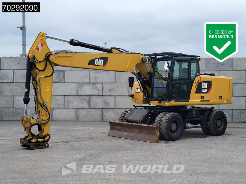 Caterpillar M322 F - Pelle sur pneus: photos 1 Caterpillar M322 F - Pelle sur pneus: photos 1