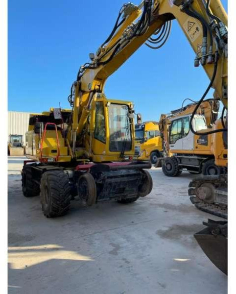 Atlas RAIL ROUTE 1404 MZ - Pelle sur pneus: photos 1 Atlas RAIL ROUTE 1404 MZ - Pelle sur pneus: photos 1