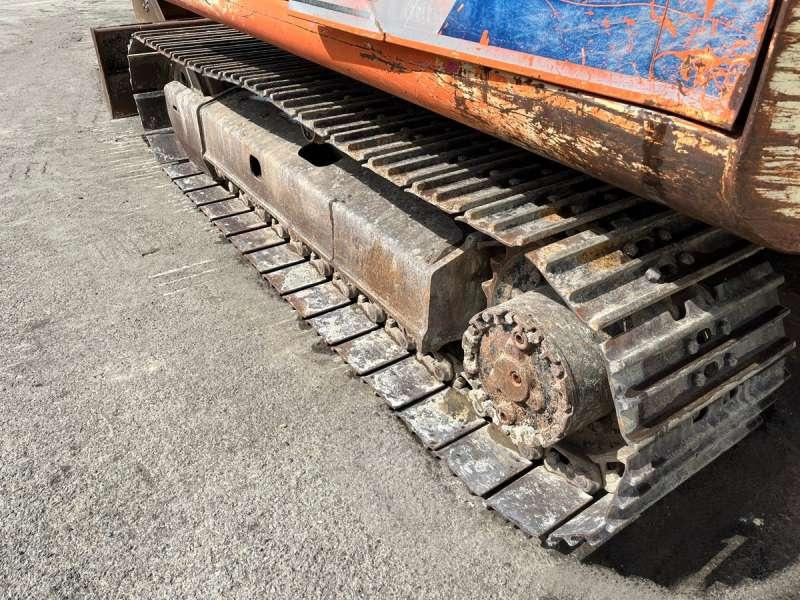 Pelle sur chenille Hitachi EX60: photos 25