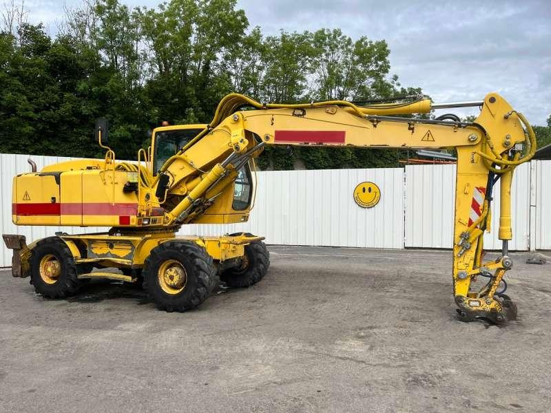 Liebherr A900 C LITRONIC - Pelle sur pneus: photos 1 Liebherr A900 C LITRONIC - Pelle sur pneus: photos 1