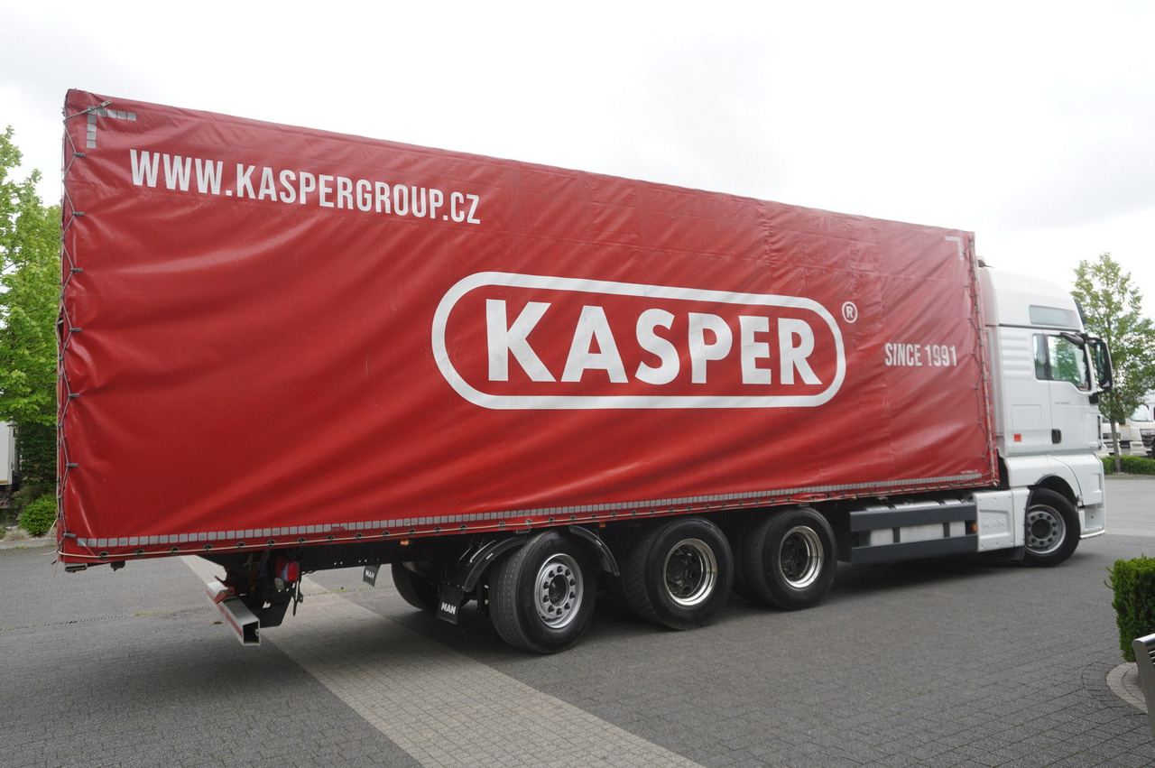 MAN MAN TGX 35.580 E6 8x4 /4 / 23 EPAL tarp superstructure / 4th axle steered - Camion à rideaux coulissants: photos 5 MAN MAN TGX 35.580 E6 8x4 /4 / 23 EPAL tarp superstructure / 4th axle steered - Camion à rideaux coulissants: photos 5