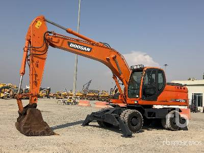 DOOSAN DX210W - Pelle sur pneus: photos 1 DOOSAN DX210W - Pelle sur pneus: photos 1