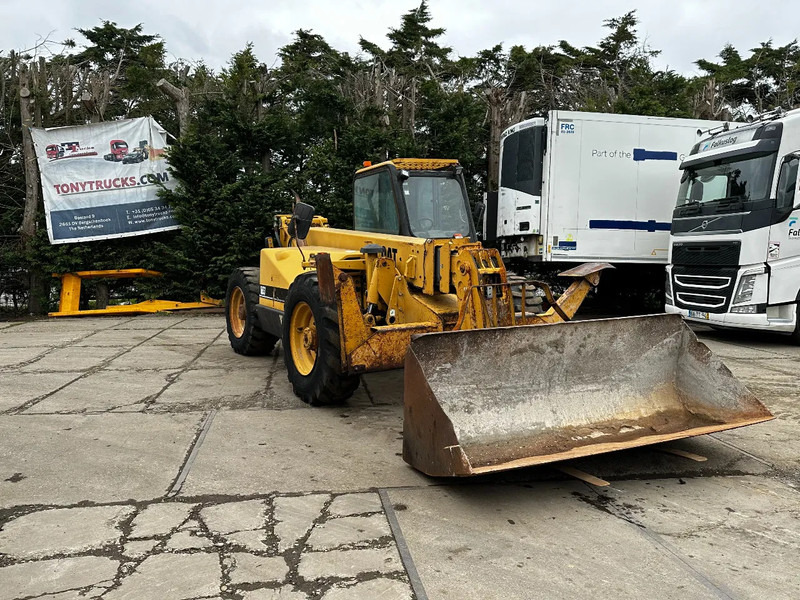 Caterpillar TH63 4X4X4 Telehandler - Chariot télescopique: photos 1 Caterpillar TH63 4X4X4 Telehandler - Chariot télescopique: photos 1