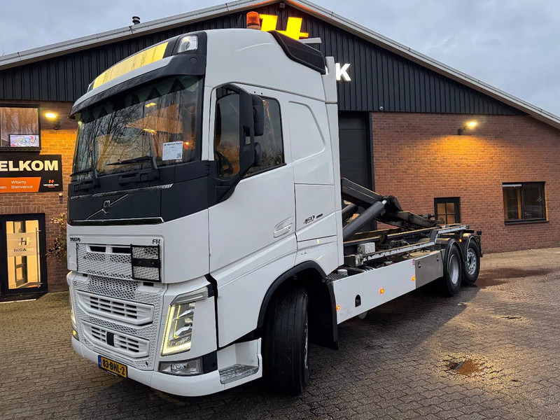 Volvo FH 460 6X2 VDL 25T Haakarm Standairco 9T Vooras Stuuras NL Truck - Camion ampliroll: photos 1 Volvo FH 460 6X2 VDL 25T Haakarm Standairco 9T Vooras Stuuras NL Truck - Camion ampliroll: photos 1