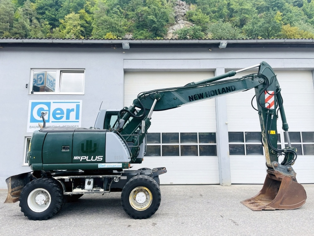 New Holland MH Plus (4054) - Pelle sur pneus: photos 2 New Holland MH Plus (4054) - Pelle sur pneus: photos 2