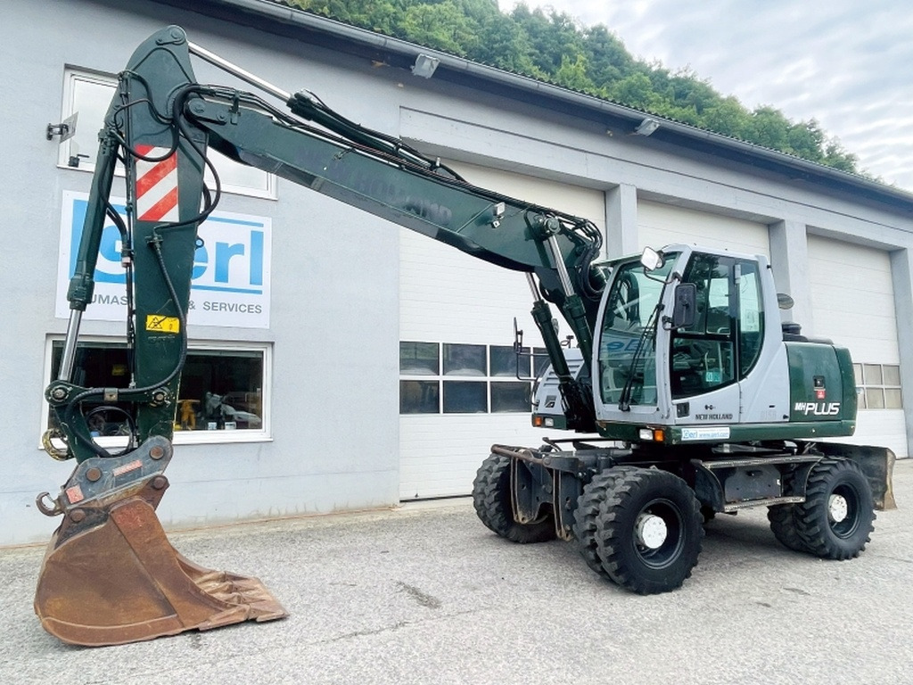New Holland MH Plus (4054) - Pelle sur pneus: photos 4 New Holland MH Plus (4054) - Pelle sur pneus: photos 4