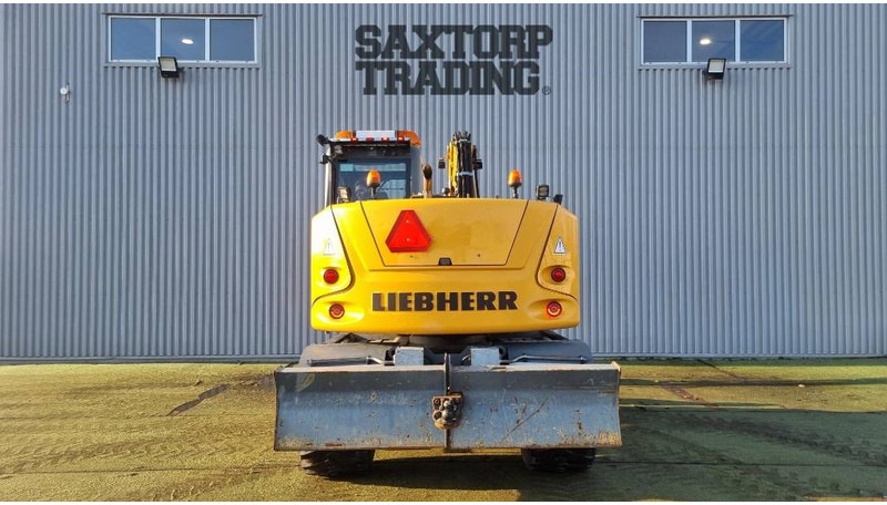 Liebherr A910 Compact, Hjulgrävare - Pelle sur pneus: photos 4 Liebherr A910 Compact, Hjulgrävare - Pelle sur pneus: photos 4