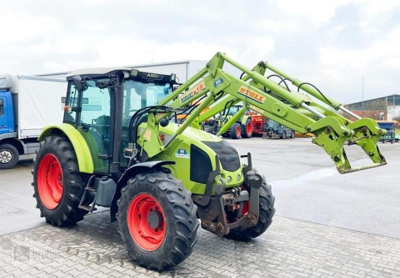 CLAAS axos 320 mit stoll frontlader - Tracteur agricole: photos 1 CLAAS axos 320 mit stoll frontlader - Tracteur agricole: photos 1