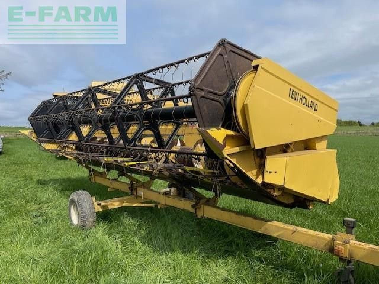 Moissonneuse-batteuse New Holland TX66: photos 6 Moissonneuse-batteuse New Holland TX66: photos 6
