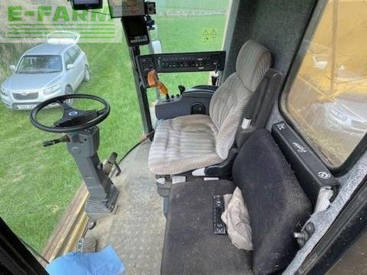 Moissonneuse-batteuse New Holland TX66: photos 7 Moissonneuse-batteuse New Holland TX66: photos 7