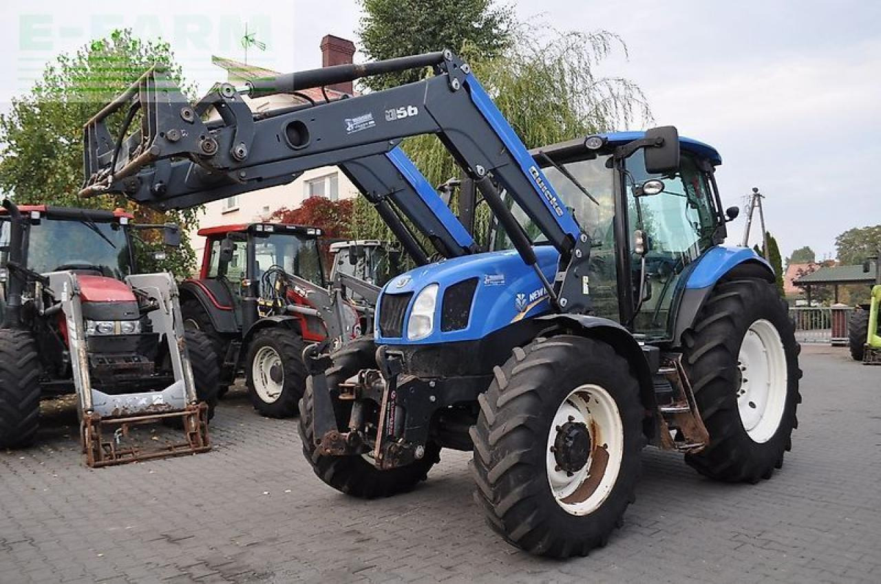 New Holland t6.140 + quicke q56 - Tracteur agricole: photos 1 New Holland t6.140 + quicke q56 - Tracteur agricole: photos 1