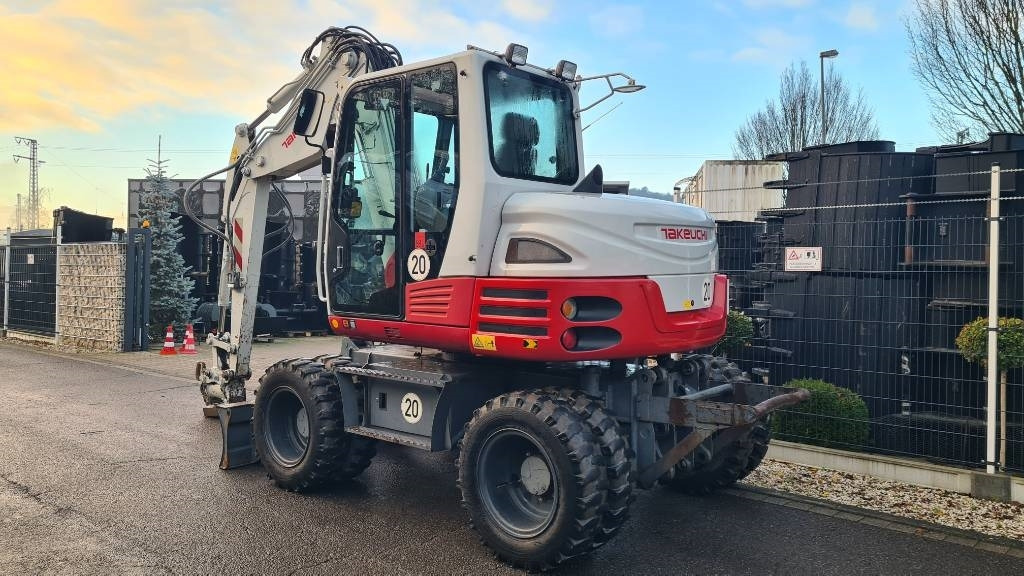Pelle sur pneus Takeuchi TB 295 W, Powertilt, Schnellwechsler MS08, Klima: photos 27 Pelle sur pneus Takeuchi TB 295 W, Powertilt, Schnellwechsler MS08, Klima: photos 27