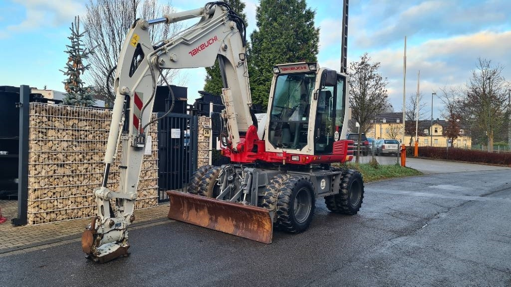 Pelle sur pneus Takeuchi TB 295 W, Powertilt, Schnellwechsler MS08, Klima: photos 22 Pelle sur pneus Takeuchi TB 295 W, Powertilt, Schnellwechsler MS08, Klima: photos 22