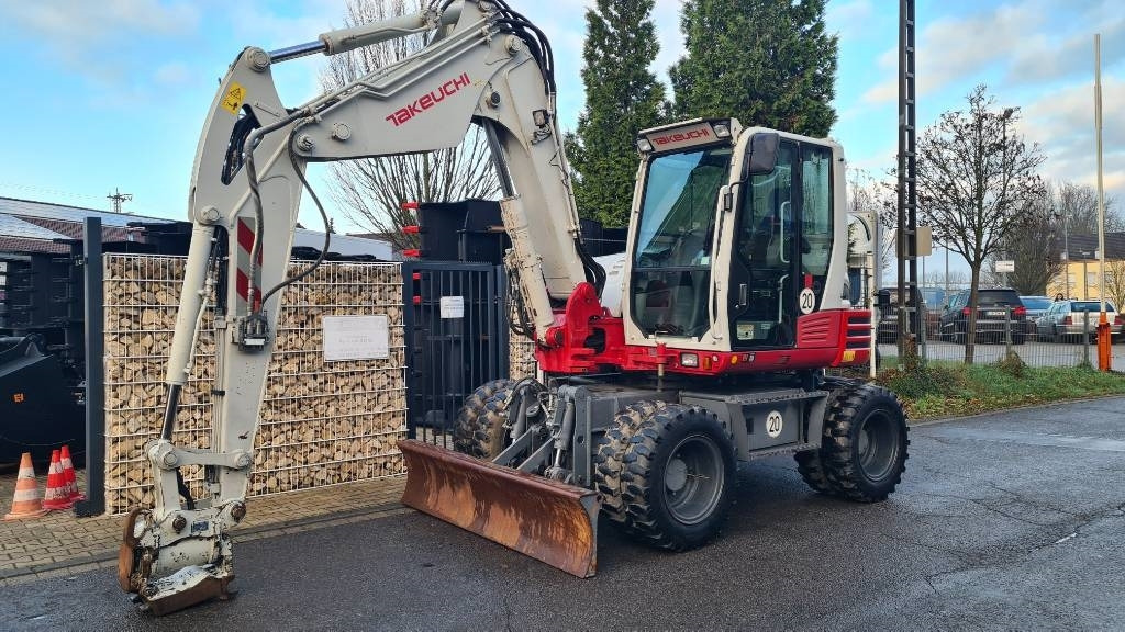 Pelle sur pneus Takeuchi TB 295 W, Powertilt, Schnellwechsler MS08, Klima: photos 24 Pelle sur pneus Takeuchi TB 295 W, Powertilt, Schnellwechsler MS08, Klima: photos 24