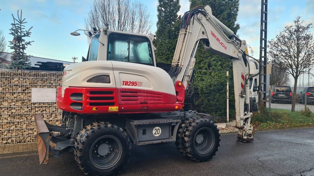 Pelle sur pneus Takeuchi TB 295 W, Powertilt, Schnellwechsler MS08, Klima: photos 16 Pelle sur pneus Takeuchi TB 295 W, Powertilt, Schnellwechsler MS08, Klima: photos 16
