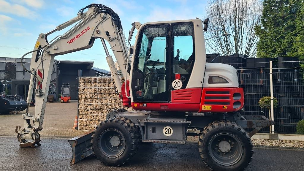 Pelle sur pneus Takeuchi TB 295 W, Powertilt, Schnellwechsler MS08, Klima: photos 26 Pelle sur pneus Takeuchi TB 295 W, Powertilt, Schnellwechsler MS08, Klima: photos 26