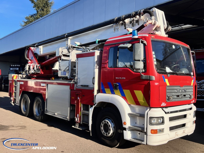 MAN TGA 26.350 Magirus ALP 320L = 32 meter, Waterpump, 6x4, Steel springs - Camion: photos 3 MAN TGA 26.350 Magirus ALP 320L = 32 meter, Waterpump, 6x4, Steel springs - Camion: photos 3