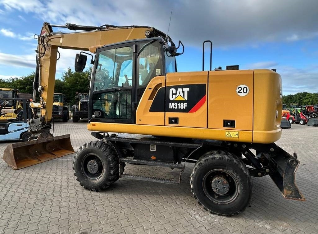 CAT M 318 F - Pelle sur pneus: photos 4 CAT M 318 F - Pelle sur pneus: photos 4