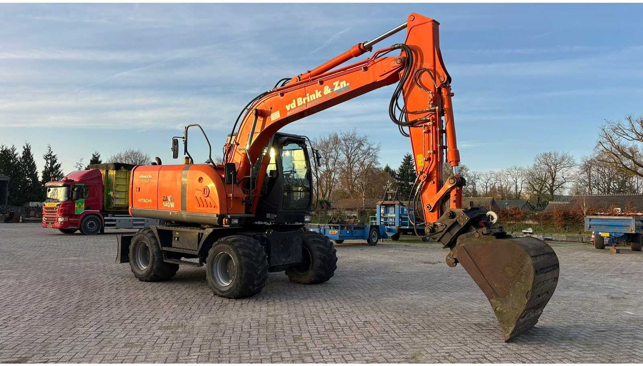 2009 HITACHI ZX140W-3 WHEELED EXCAVATOR - Pelle sur pneus: photos 2 2009 HITACHI ZX140W-3 WHEELED EXCAVATOR - Pelle sur pneus: photos 2