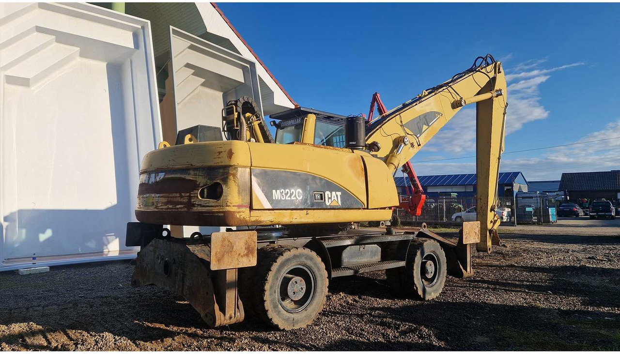 Caterpillar M322C - Pelle sur pneus: photos 3 Caterpillar M322C - Pelle sur pneus: photos 3
