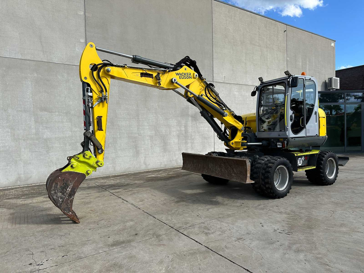 Wacker Neuson EW100 - Pelle sur pneus: photos 1 Wacker Neuson EW100 - Pelle sur pneus: photos 1
