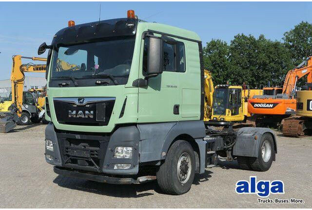 MAN 18.420 TGX 4x4, HydroDrive, Hydr., Klima, Liege - Tracteur routier: photos 1 MAN 18.420 TGX 4x4, HydroDrive, Hydr., Klima, Liege - Tracteur routier: photos 1