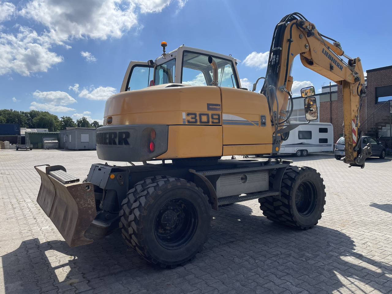 Liebherr A309 - Pelle sur pneus: photos 3 Liebherr A309 - Pelle sur pneus: photos 3