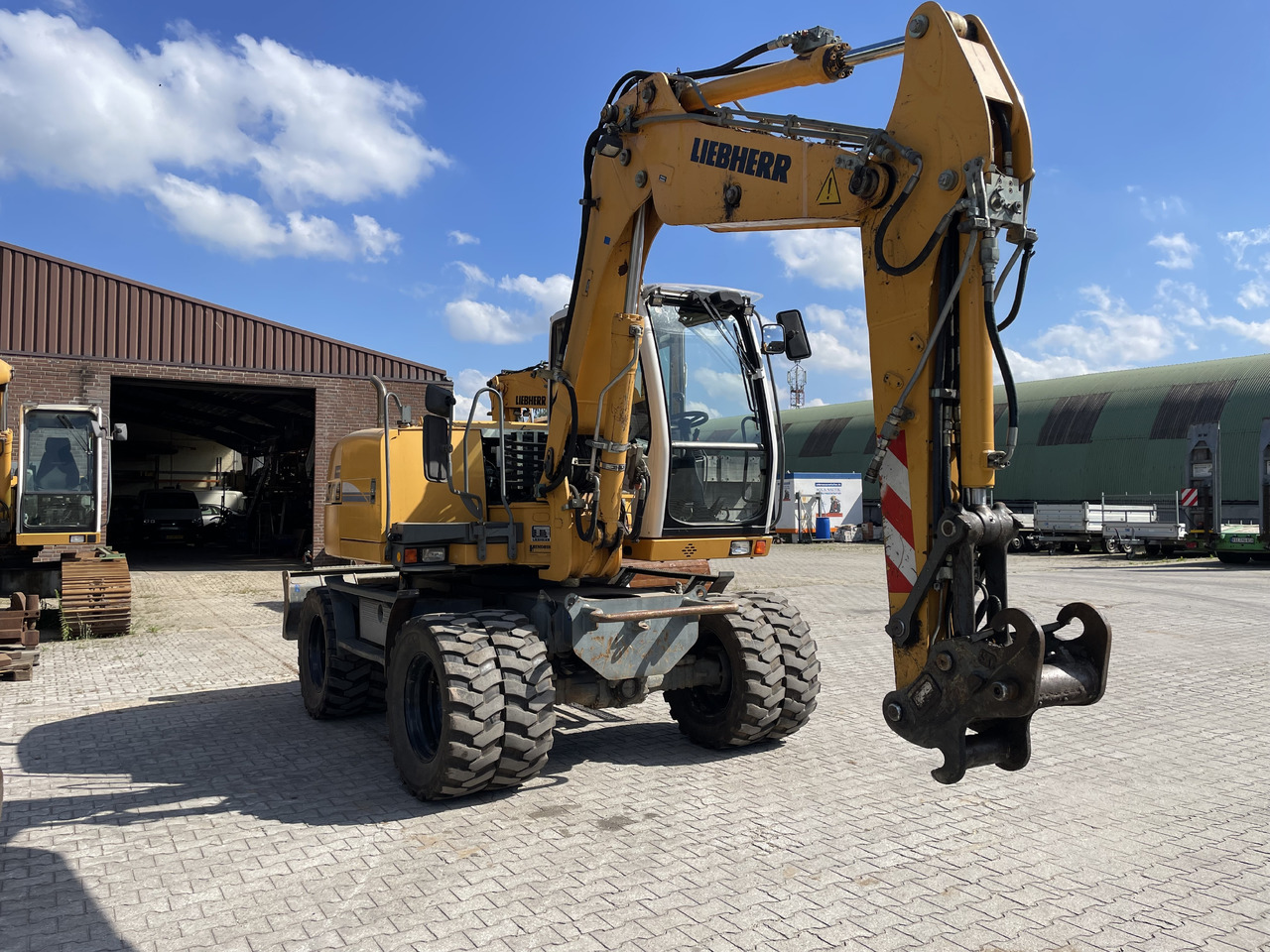 Liebherr A309 - Pelle sur pneus: photos 4 Liebherr A309 - Pelle sur pneus: photos 4