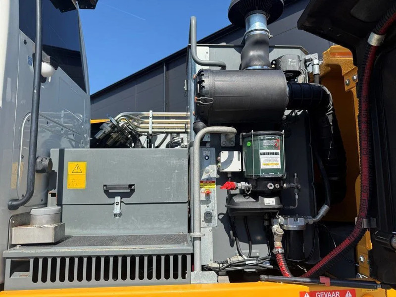 Pelle sur pneus Liebherr A914 2018 8950 uur NL Machine: photos 16