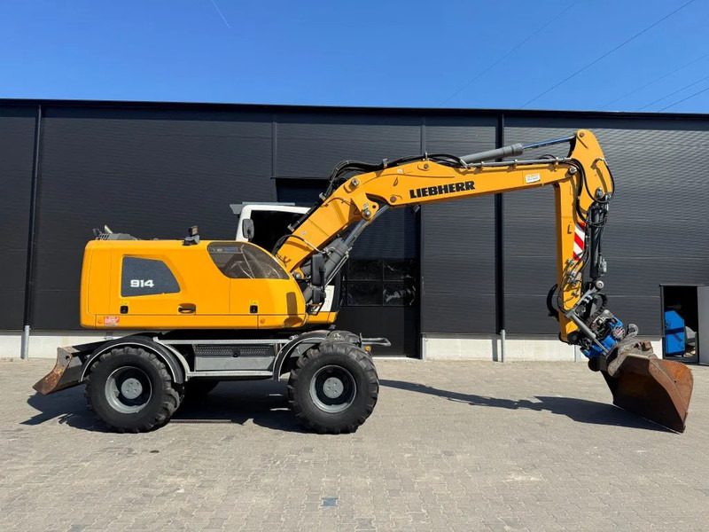 Pelle sur pneus Liebherr A914 2018 8950 uur NL Machine: photos 6